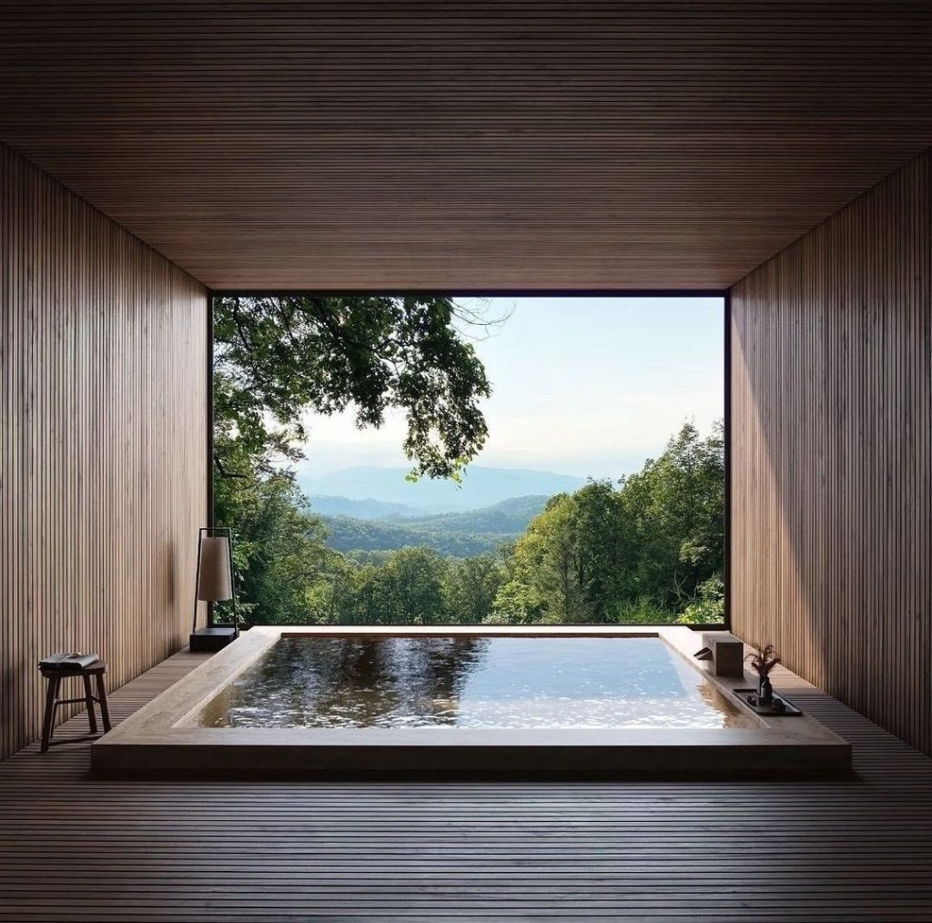 A beautiful wellness center, onsen style with a pool overlooking the jungle