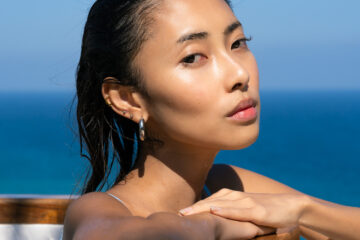 lady coming out of an icebath with the sea view.