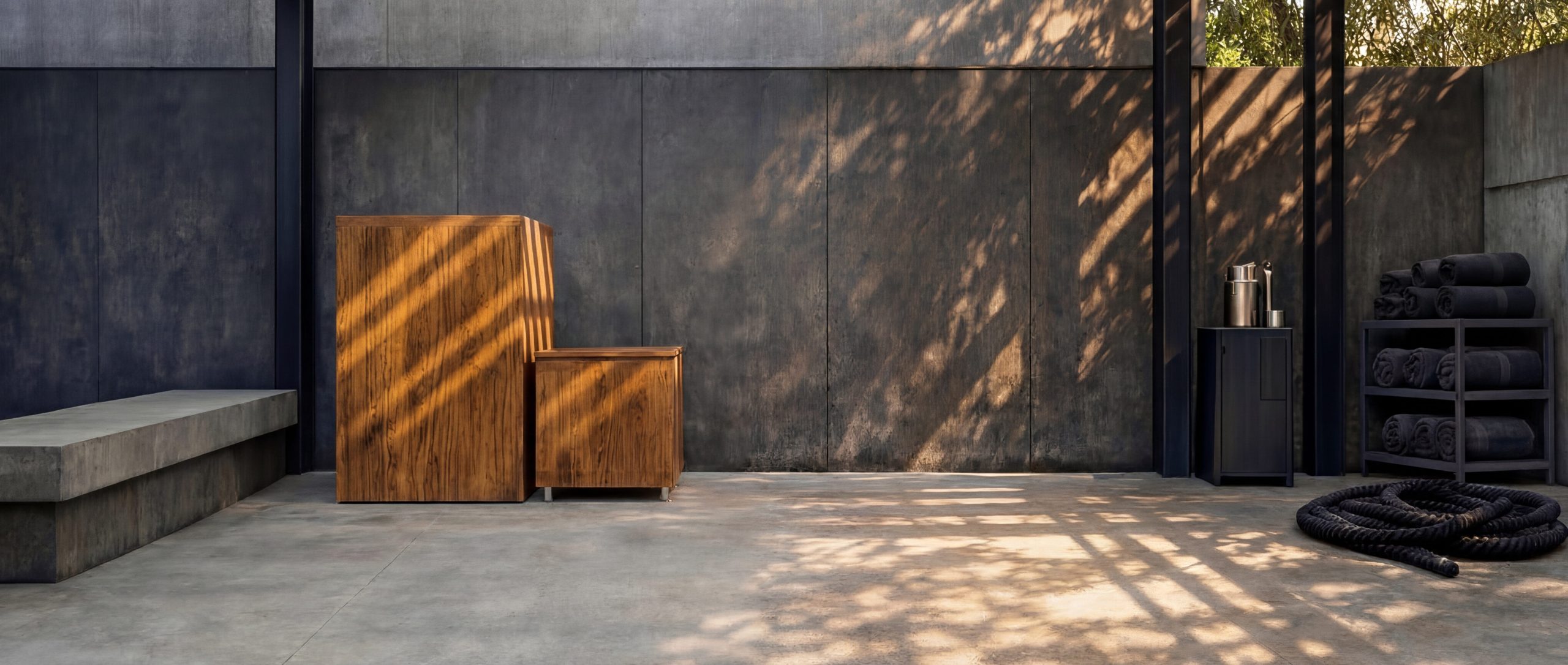 An icebaths.comm cold plunge, the cube model, in a high end outdoot boutique gym.