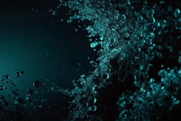Moody close-up of a still cold water surface with subtle reflections, symbolising the correction of misinformation around ice bath benefits.