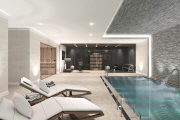 Sauna and cold plunge setup in a calm, well-designed wellness facility interior, showing what a quality contrast therapy space looks like