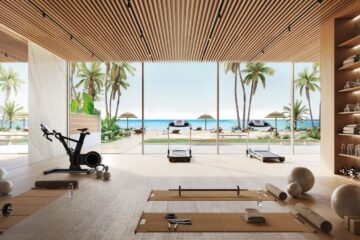 Modern Class A property wellness space with a cold plunge pool and sauna, representing the rental premium associated with WELL certification.